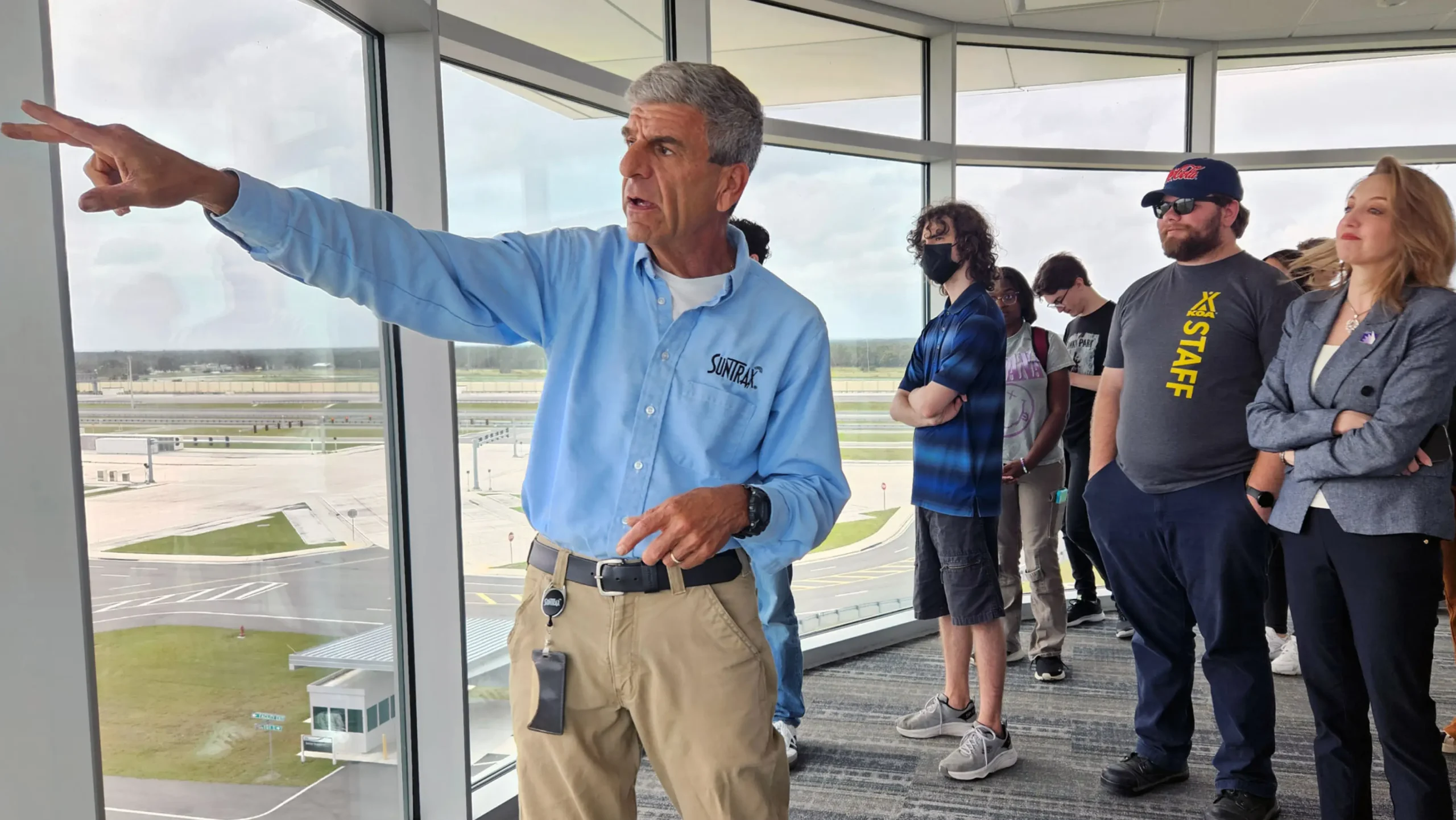 Dave Weiner, technical services manager at the SunTrax transportation testing and development facility, talks to a group of Florida Polytechnic University autonomous vehicle students and faculty on Tuesday, Nov. 5.