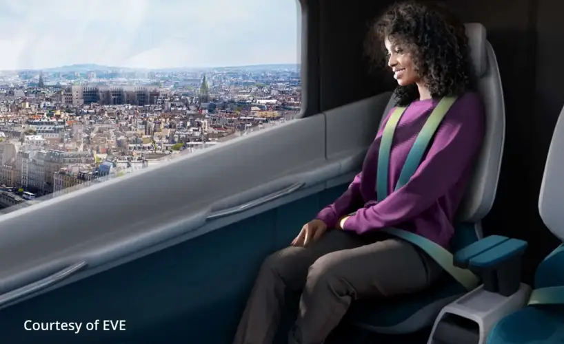 eVTOL passenger looking out the window of eVTOL.