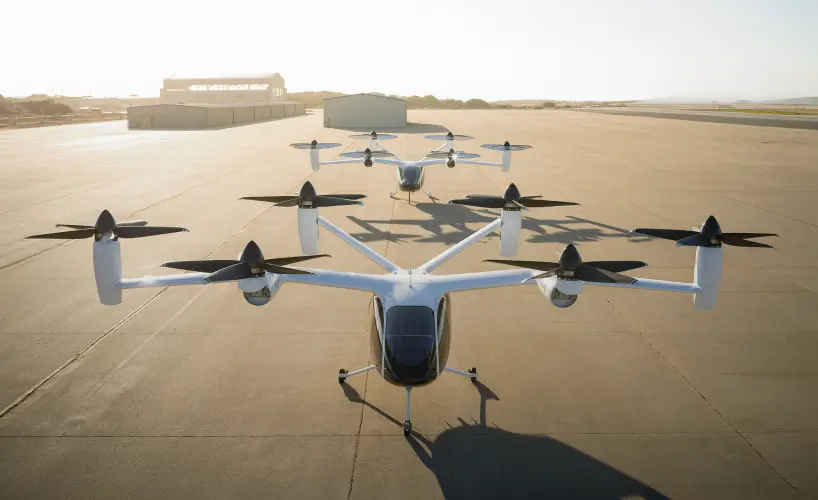 Electric vertical takeoff aircraft on runway preparing for flight test